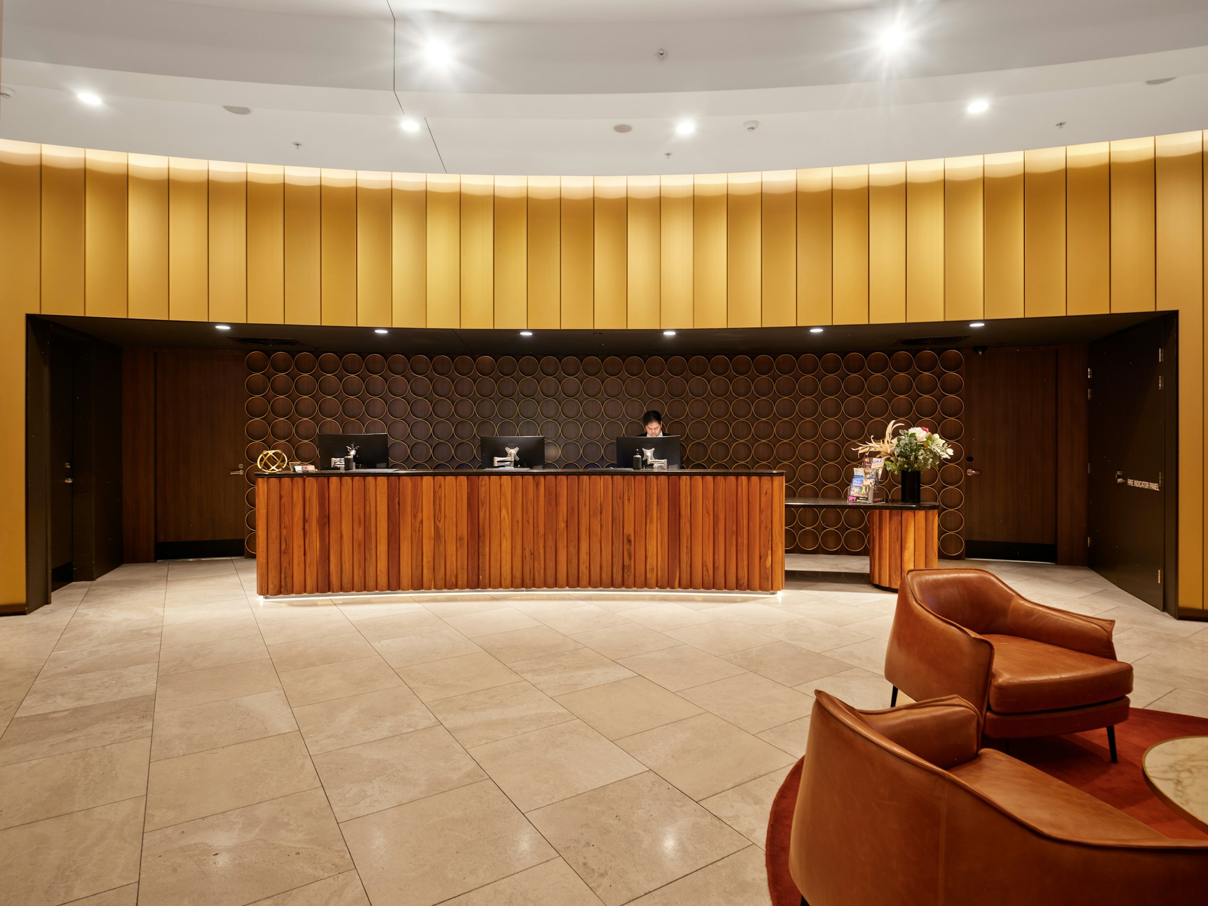 A warmly lit reception desk